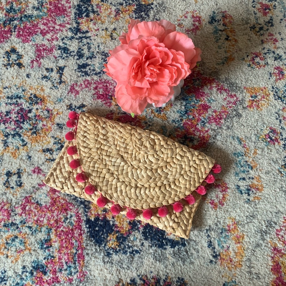 Boho woven style pom pom clutch